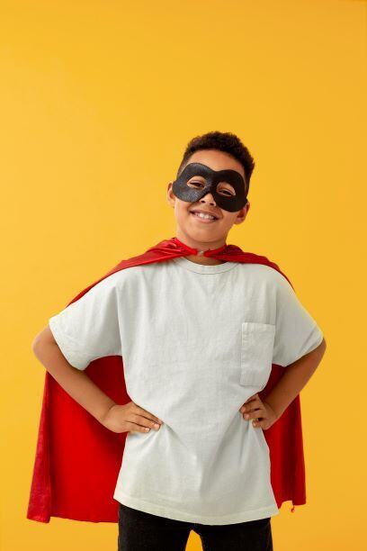 portrait-young-boy-with-superhero-cape