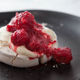 Pavlova with Vanilla Bean Cream and Raspberries